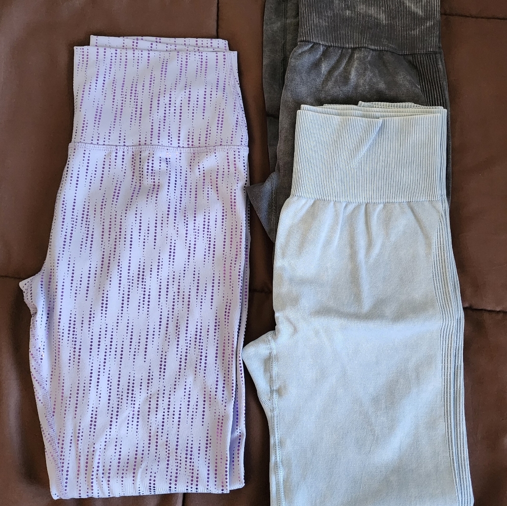 3 pair of lightly used leggins 2 "pink" and 1 Scorpio Sol sz med